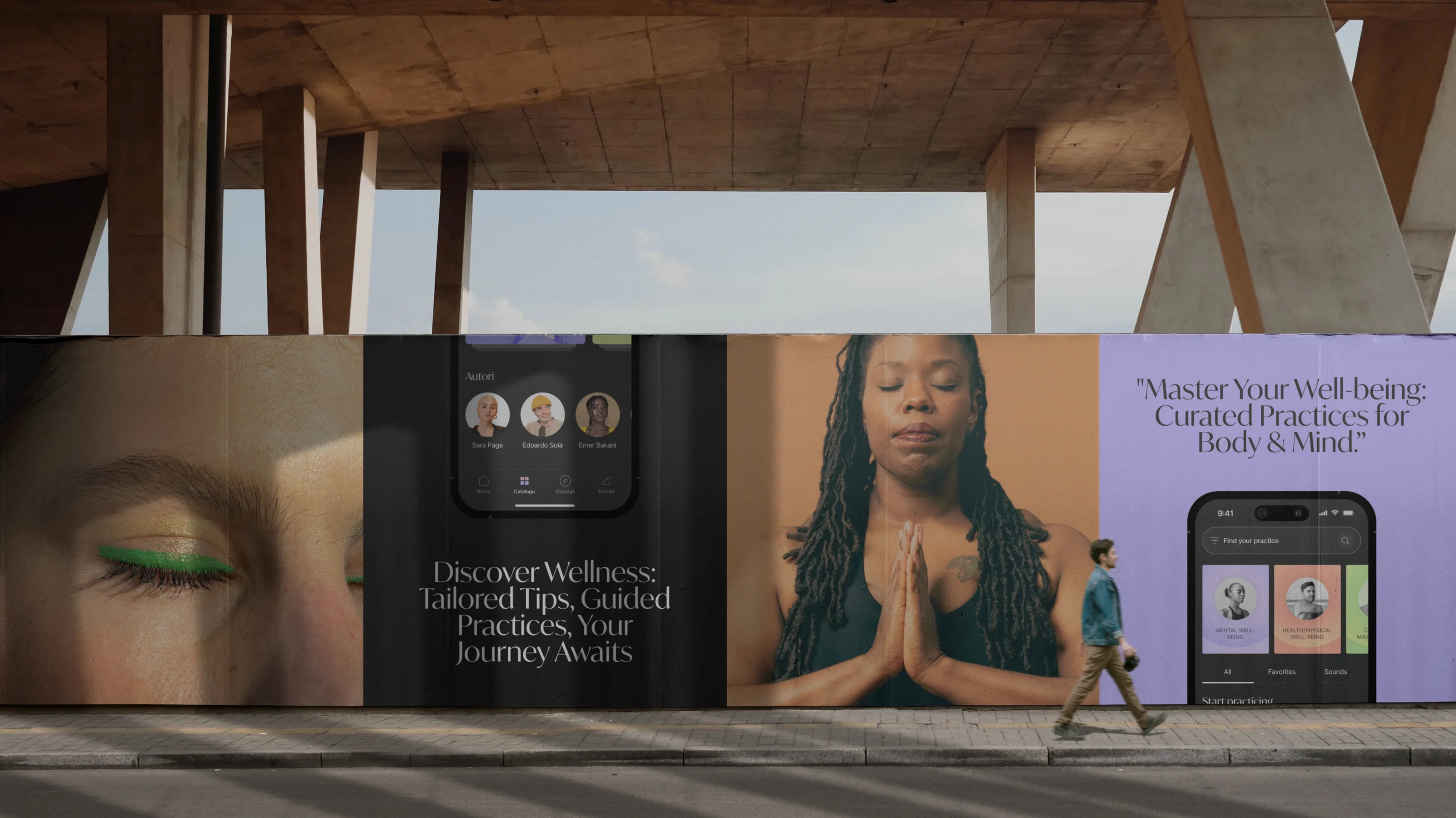 a woman walking down a street past a billboard